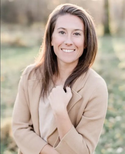 Haley Sandberg, Doctor at Desert Pine Chiropractic, smiling outdoors in a professional outfit, representing the caring chiropractic team in Bellingham.